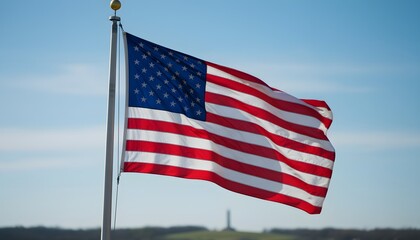 Obraz premium Bold American Flag Flapping on Windy Day at Open Field