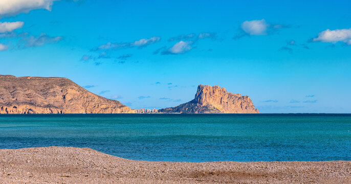 Panoramic view of Playa de Altea beach at the Mediterranean sea Costa Blanca shoreline with seafront Morro de Toix and Ilfach cliffs of Altea in Spain