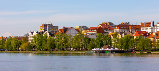Panoramic view of Elk town with historic city center and waterfront promenade at Jezioro Elckie Lake in Mazuria lakeland region of Poland © Art Media Factory