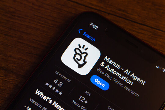 Mexico City, MEXICO - Apr 14 2026 : Close-up of an iPhone displaying the App Store listing for Manus, an AI agent and automation app for web development, slides, and research.