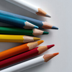 Fototapeta premium Colored pencils white background art supply drawing creativity vibrant sharp arrangement education stationery