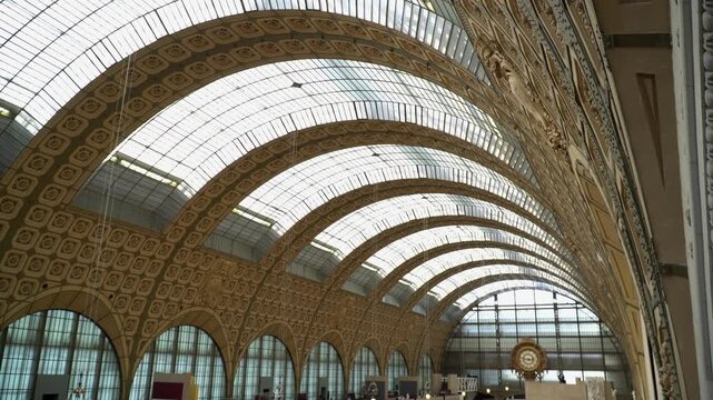 Arched glass ceiling of former Orsay railway station in Paris, France.