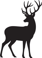 Fototapeta premium Graceful silhouette of a stag with large branching antlers standing in profile.