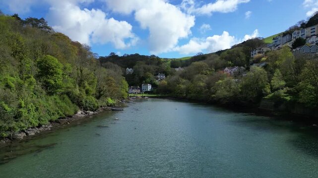 Kingswear, Devon, England: DRONE VIEWS: The drone flies low over Waterhead Creek towards Jubilee Park at the end of the Creek. South Devon is a popular UK holiday destination.