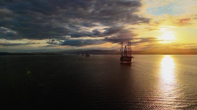 sunset at cromarty oil rig station by drone