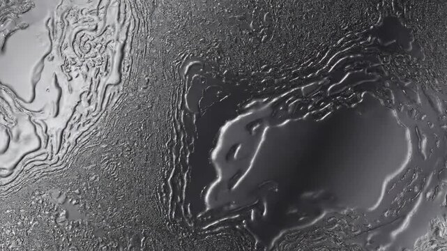 Liquid surface with a reflective metallic sheen, wavy textures