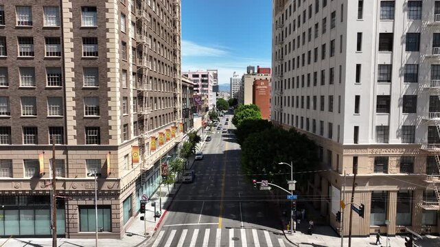 Los Angeles, California, USA - Drone Aerial View of Downtown LA Fashion District with Residential Housing, Commercial Properties and Heavy Traffic on City Streets