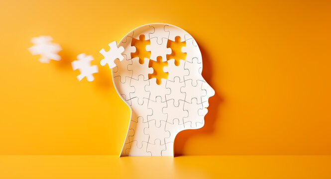 Head and brain diseases concept - missing pieces flying of the brain puzzle on yellow background with copy space