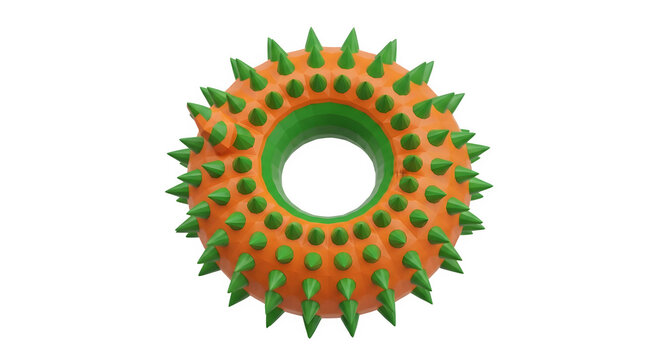 A vibrant orange and green spiky toy with a circular hole sits on a clean surface.