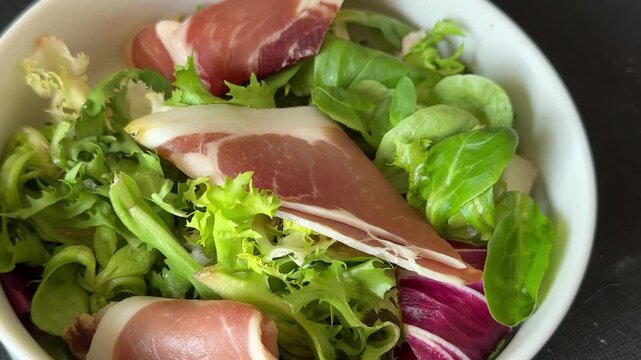 jamon salad mixed green salad leaves meat dish tasty snack fresh, delicious, gourmet food background rustic food on the table, top view, copy space