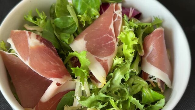 jamon salad mixed green salad leaves meat dish tasty snack fresh, delicious, gourmet food background rustic food on the table, top view, copy space