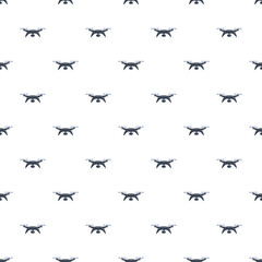Fototapeta premium Drone quadcopters forming a seamless pattern, illustrating modern technology and aerial surveillance