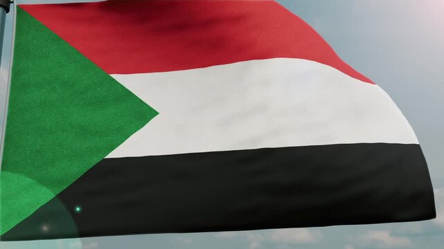 sudan Flag Waving Above Clouds at Sunrise