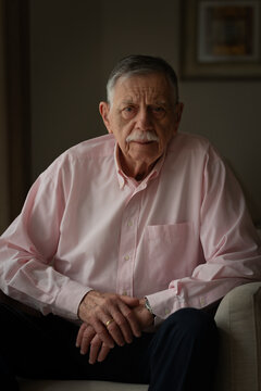 Active senior portrait in an armchair