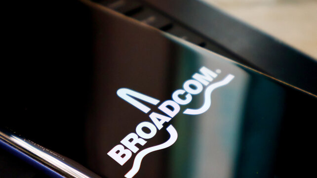 A close-up view of the Broadcom logo on a sleek, modern electronic device