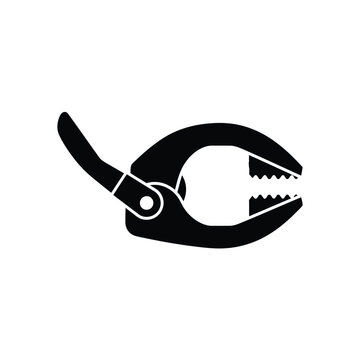 Black silhouette of a nutcracker with a nut