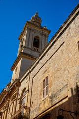 Obraz premium Historic fortified city of Mdina with ancient stone walls and architecture in Malta