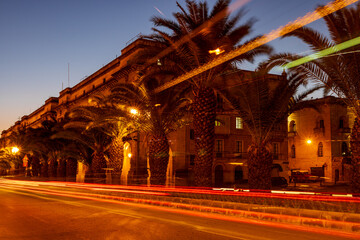 Naklejka premium Historical old town and harbor in the capital city of Valletta Malta at night