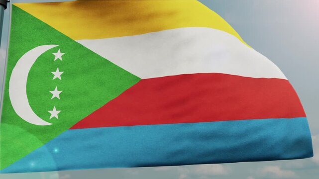 comoros Flag Waving Above Clouds at Sunrise
