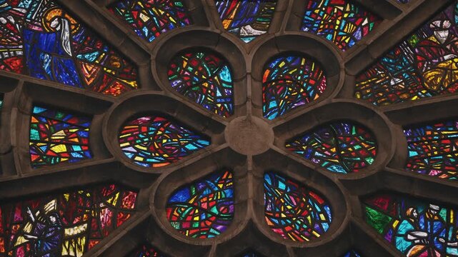 Colorful Rose Window Stained Glass Detail in Church Interior