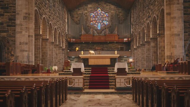 Symmetrical Church Interior with Altar and Stained Glass Ireland