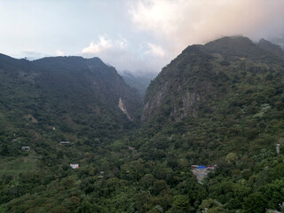 imposing mountain view with cloud mist in santa cruz on lake atitlan guatemala volcanic nature landscape wonder beauty relaxing relax travel tourism destination mountains volcano