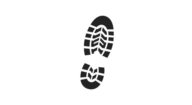 Black boot footprints on ground.