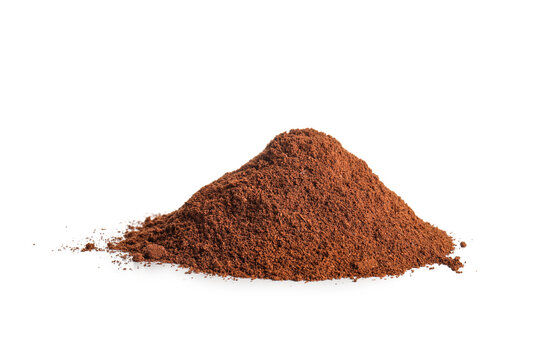 Pile of ground coffee on white background