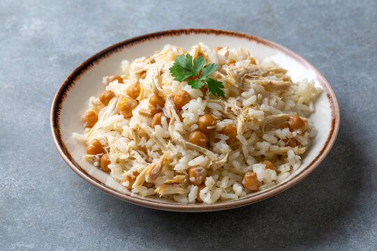 Traditional delicious Turkish food; Rice with chickpeas and chicken (Turkish name; Tavuklu nohutlu pilav or pilaf)