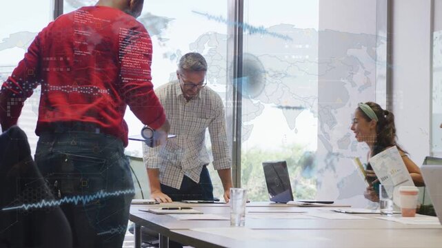 Center man checking laptop while man in red bringing box for business, overlay showing data