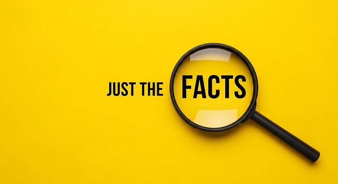 Magnifying glass focused on the words just the facts