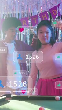 Vertical video: Duo dancing, playing pool at birthday; man starting stream, overlays updating