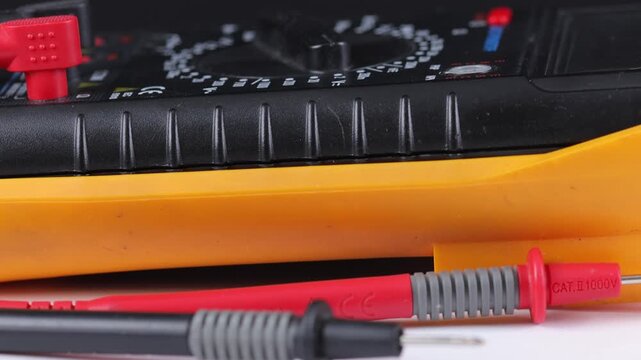 A digital multimeter for measuring the parameters of electrical circuits. Close-up. Soft focus.