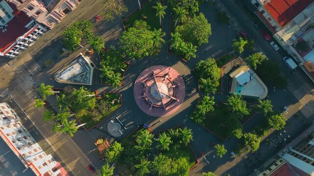 Pink Octopus Kiosk and Plaza de Armas Zenith Aerial Drone Travel Up from 100 to 200 Meters with Smooth Rotation Movement in the Historic Center of Tampico Tamaulipas Mexico