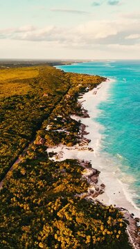 Aerial Drone View of Tulum Coastline at Sunset Caribbean Beach Riviera Maya Mexico