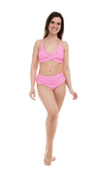 Fototapeta premium Woman in pink swimsuit on white background