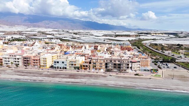 beach urban coast city building drone vacation facade town landscape industry business success greenhouse field agriculture summer rural sea - Balerma, Andalusia, Spain - 2025