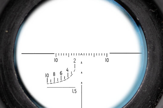 Circular optical scope with dark center and transparent alpha channel background for overlay