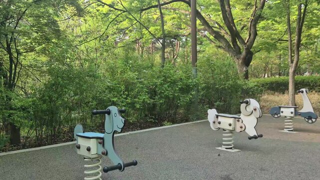 8K UHD Empty Rocking Chair Swaying Gently in the Wind at Public Park