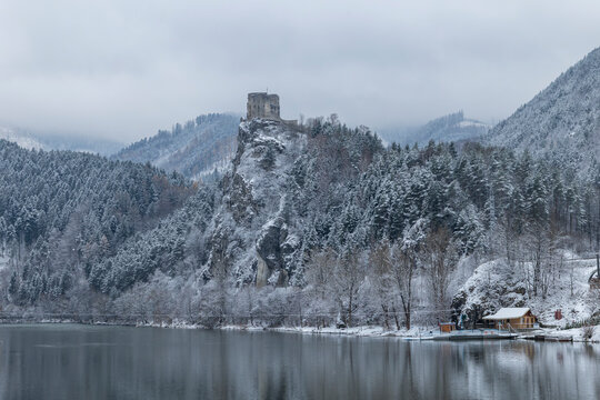 Stary hrad castle ruins on mountain overlooking river Vah