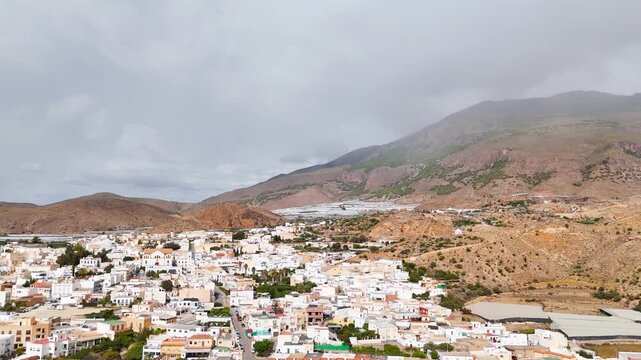 town mountain city aerial drone view environment hill dry forest nature old urban texture horizon landscape white house building home housing - Dal&iacute;as, Andalusia, Spain - 2025