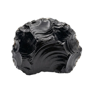Black obsidian stone with conchoidal fracture patterns and glossy volcanic glass surface isolated.