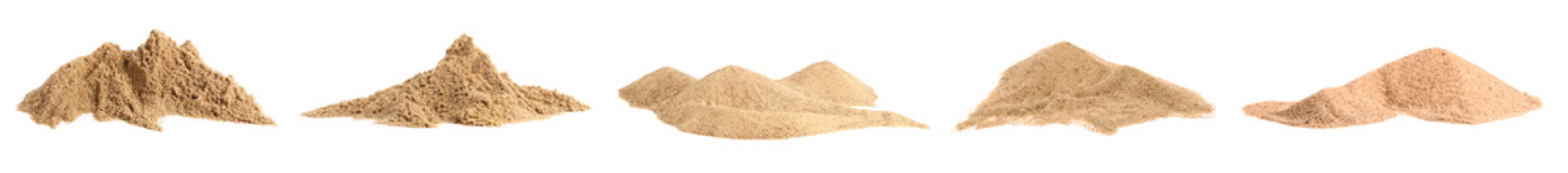 Heaps of sand on white background