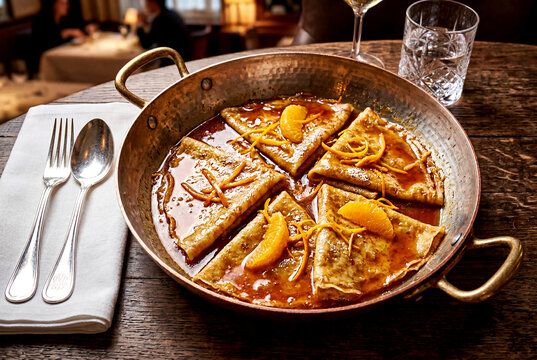 Classic French Crepes Suzette in Orange Liqueur Sauce Overhead View