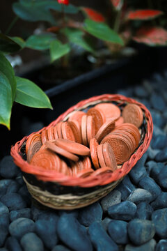 Kreweng, pieces of clay pottery or terracotta, used as symbolic currency by the bride's parents during the "dodol dawet" in "siraman" ceremony