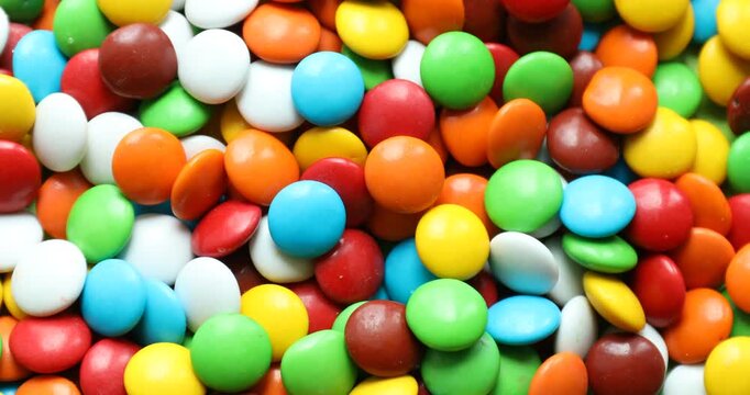Pile of delicious colorful as background, rotating