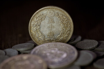 Meiji Era Japan 50 Sen Silver Coin Reverse Standing Among Coin Pile © Mr