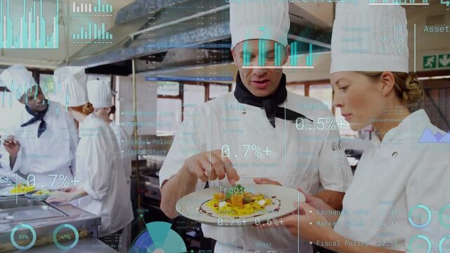 Senior chef taking plate and guiding junior chef in kitchen training, HUD guiding plating