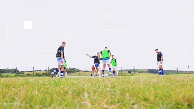 Kicker starting run and kicking ball, players contesting and scrambling to protect goal
