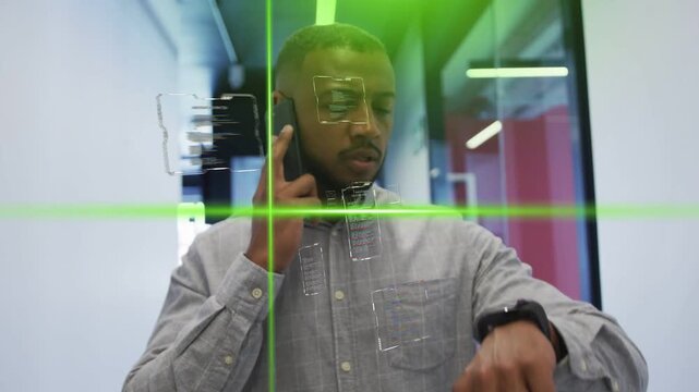 Manager walking hall handling work phone call checking watch activating green crosshair UI on glass
